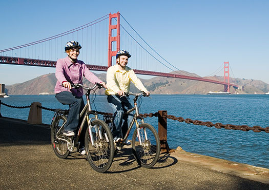People biking near Golden Gate Bridge